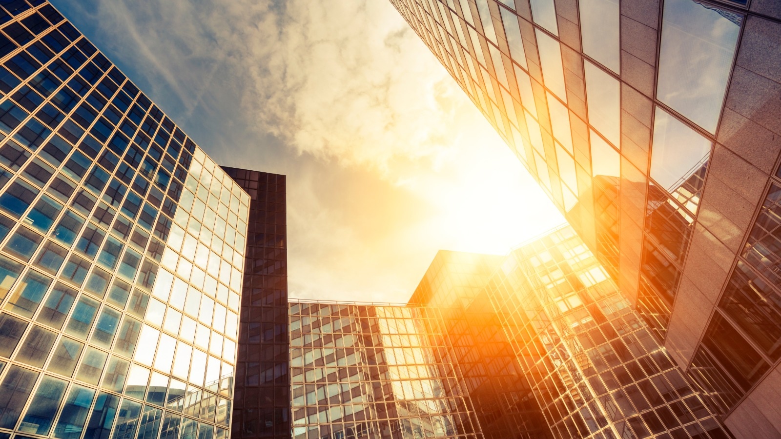 An image of buildings in the city at golden hour.