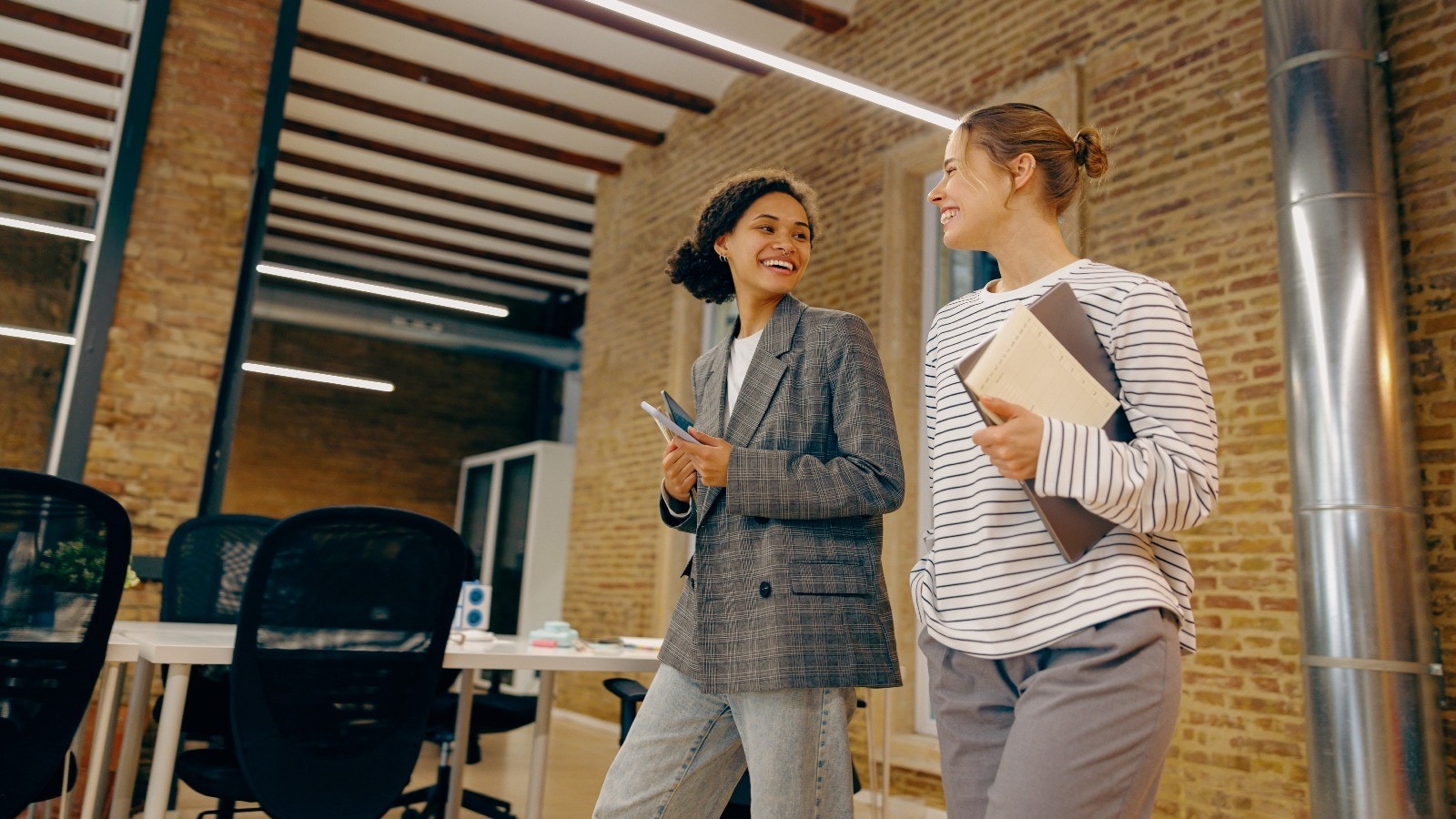 two people working together