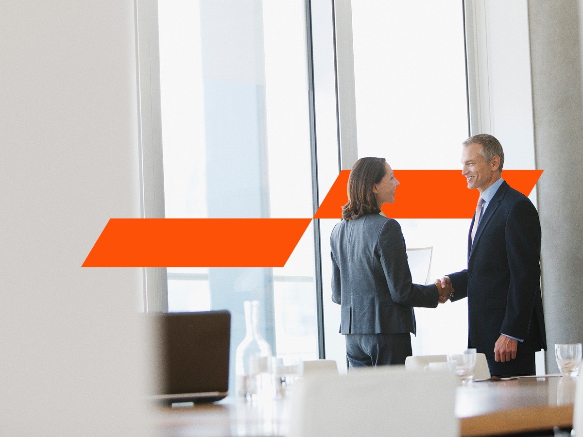 man and a woman shaking hands, momentum mark