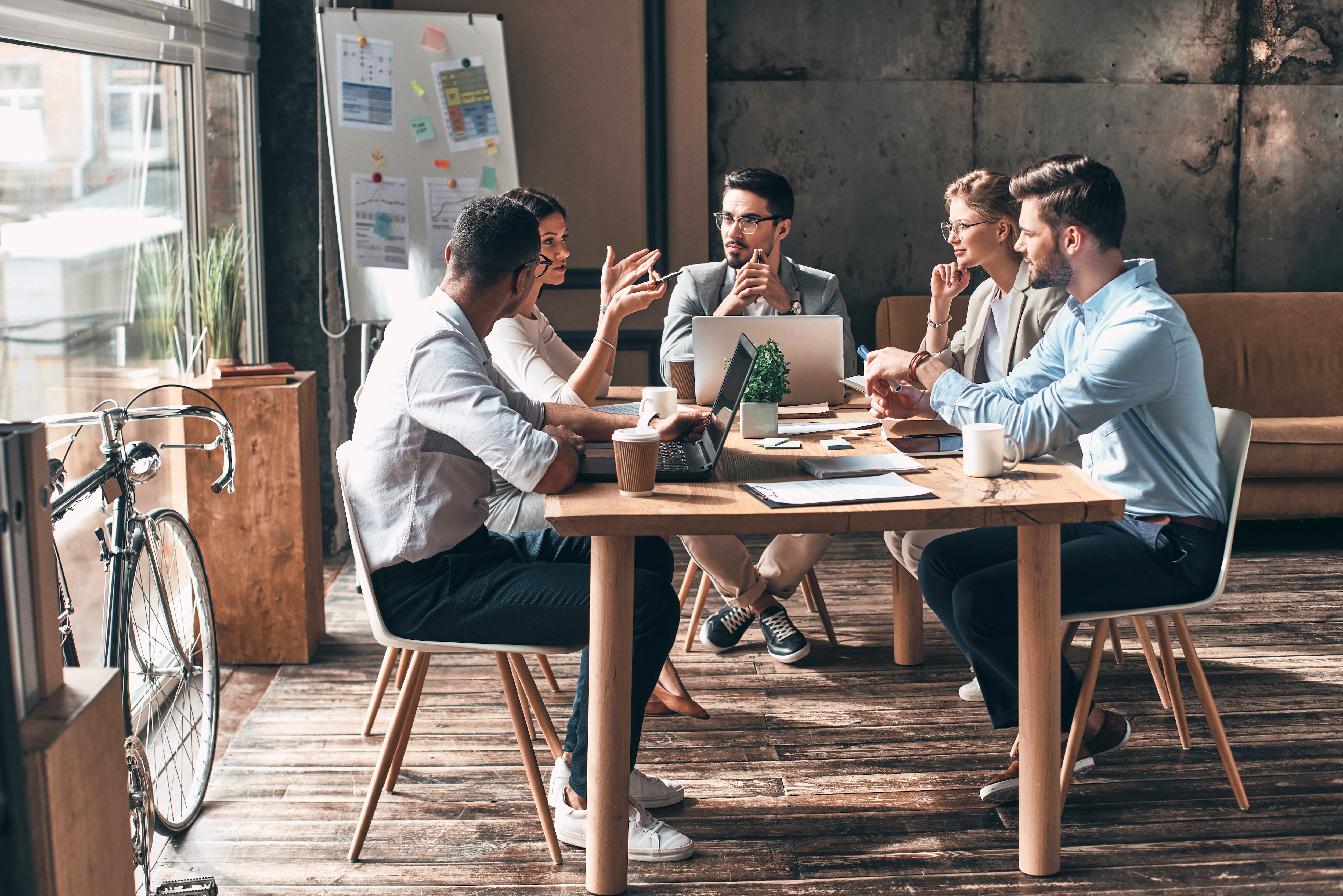 office workspace with many people working together